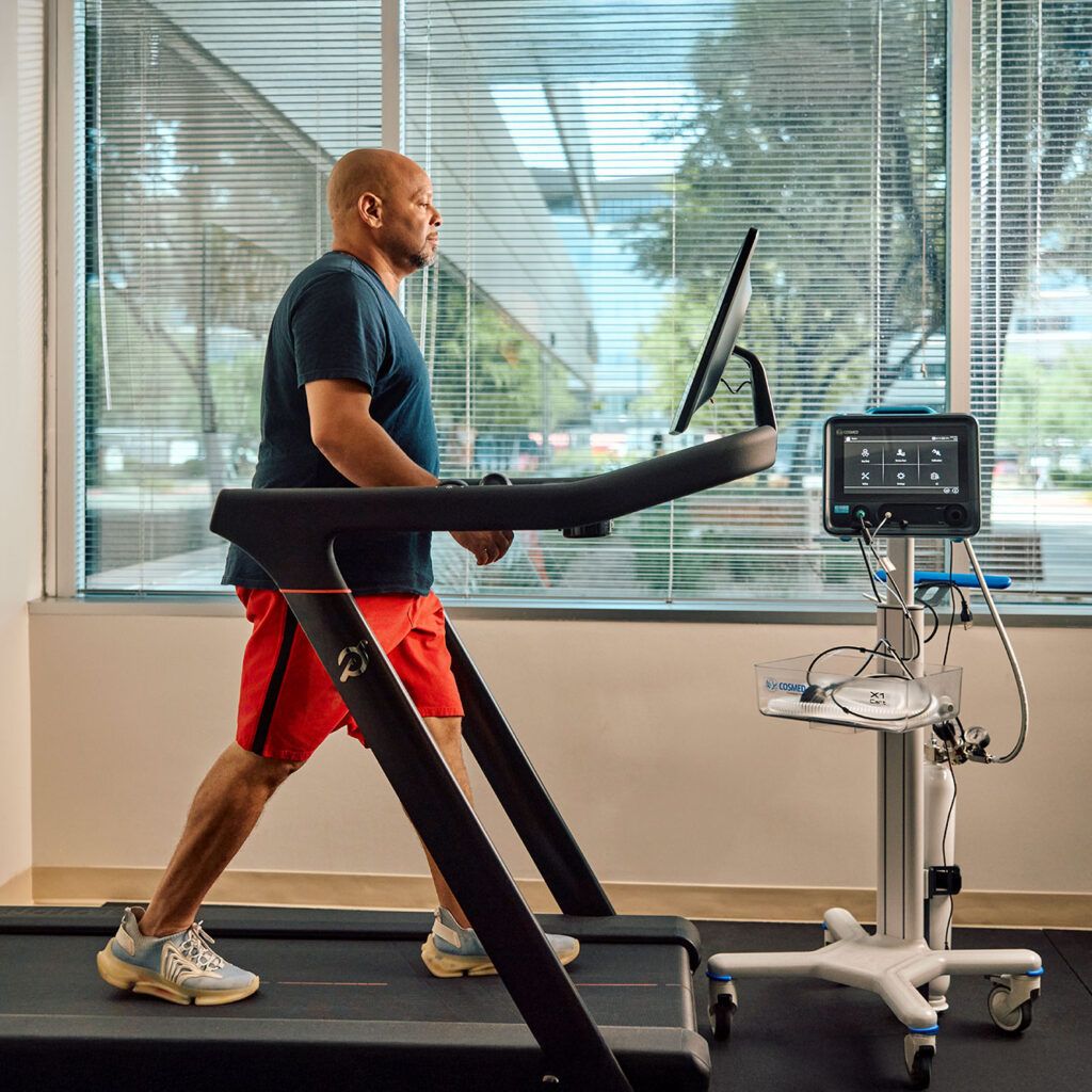 Man walking on a treadmill during a VO2 max test